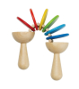 This classic Plan Toys Clatter toy is a musical toddler toy with natural rubberwood handles and brightly painted discs that rattle and clatter together. White background.