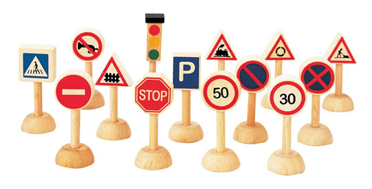 This set of 14  wooden toy road signs and traffic lights will keep your Plan City in order - including traffic lights, speed restriction signs and stop signs for small world play. White background.