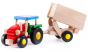The Bajo wooden tractor and Trailer toy, made from solid hardwood with a red, green and blue painted finish and natural wood trailer. Showing tipping mechanism on the trailer.