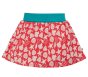 this two-in-one skort is a vibrant pink organic cotton jersey skirt with a beautiful white seashell print, layered over shorts with a stretchy fold-down blue waistband from frugi