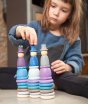 Grapat Winter Nins Seasonal Play Set, including nins, magos, rings, coins and mates in the cool, icy colours of winter. Perfect for open-ended play. Child stacking toys at home.
