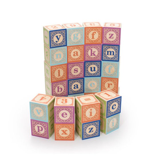 Lowercase Uncle Goose plastic free alphabet blocks stacked up on a white background