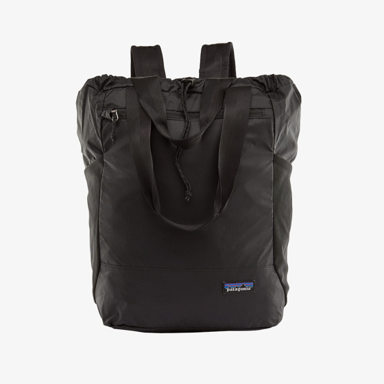 Picture of the black tote pack (front view). Picture background is white.