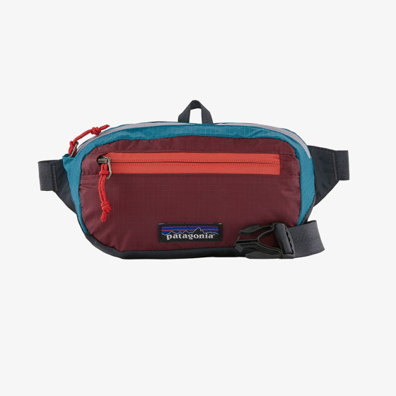 Patagonia ultralight black hole  mini hip pack in patchwork and roamer red.