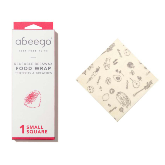 Abeego small square beeswax food wrap on a white background next to its box
