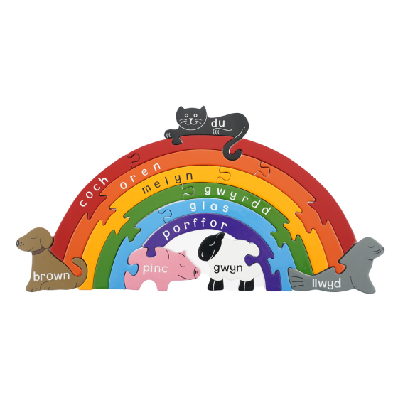 Alphabet Jigsaw eco-friendly wooden welsh rainbow puzzle toy stood up on a white background