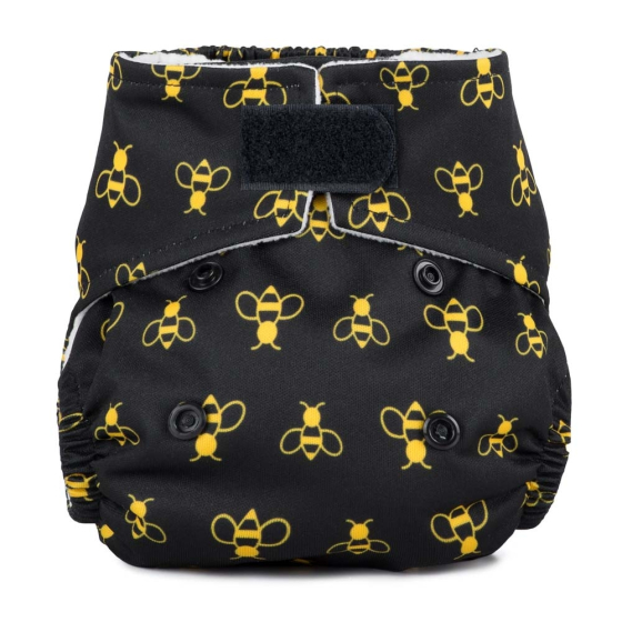 Baba & Boo Bees newborn reusable nappy print is black with a yellow bee design with black velcro closure. White background. 