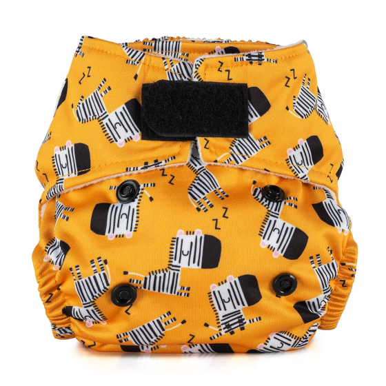 Baba + Boo eco-friendly reusable Newborn Yellow Nappy with repeat pattern of sleepy zebras, black velcro closure tab, photographed on a white background