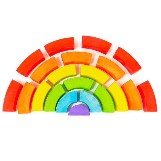 Bajo plastic-free stacking wooden rainbow blocks laid out on a white background