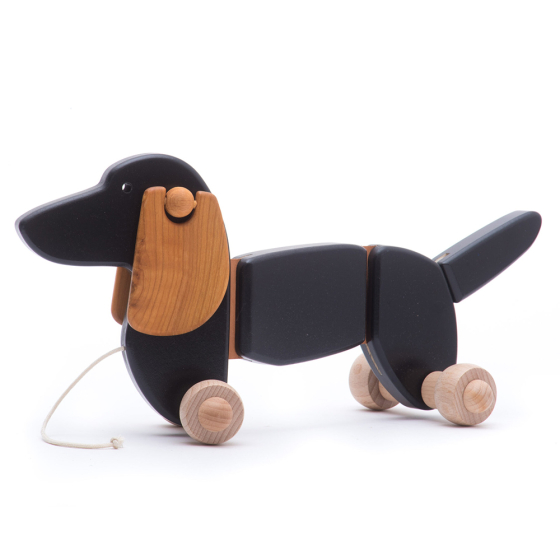 Bajo sustainable wooden pull dog toy on a white background