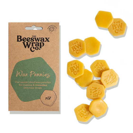 The Beeswax Wrap Co solid rewaxing pennies laid out on a white background
