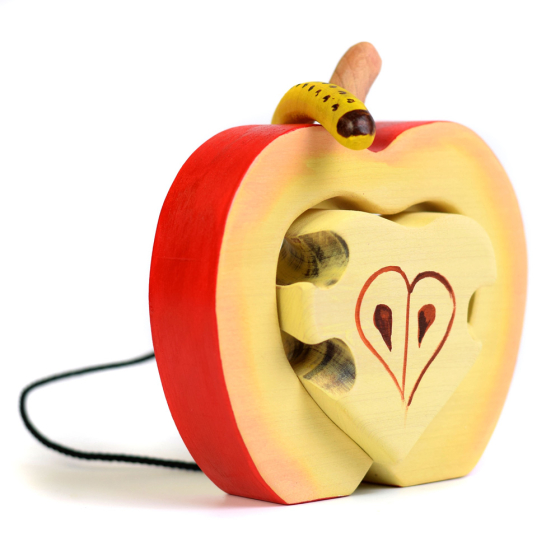 Bumbu eco-friendly wooden apple with threading worm toy on a white background