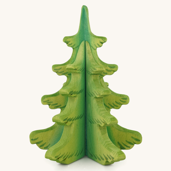 Bumbu handmade green wooden pine tree toy on a beige background