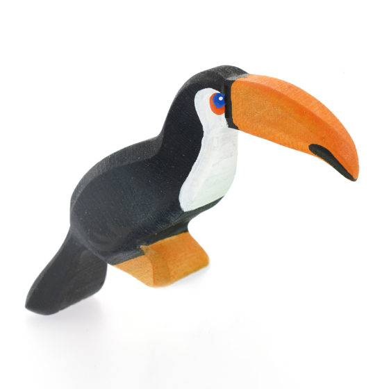 Bumbu handmade wooden sitting toucan figure on a white background