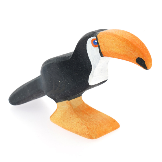 Bumbu handmade wooden standing toucan figure on a white background