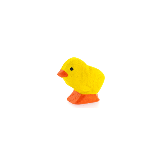 Bumbu small handmade wooden chick toy on a white background