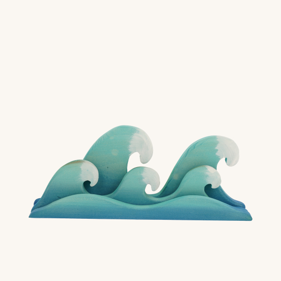 Bumbu Handmade Wooden Waves Toy. Beautifully painted wooden waves in different shades of blue with white painted tips on the waves, on a cream background