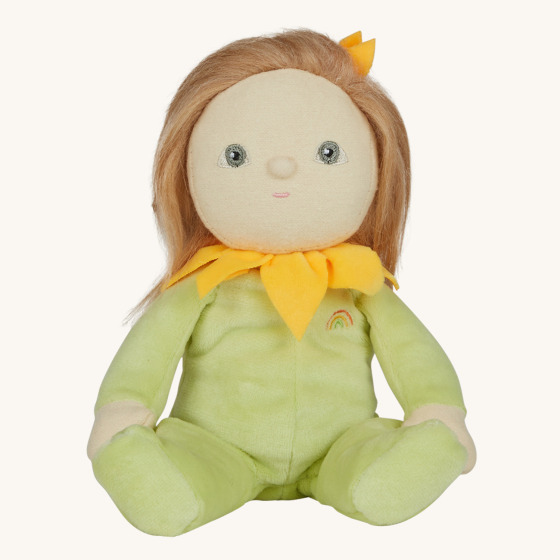 Olli Ella Dinky Dinkum Blossom Buds - Sunny Sunflower in a pale green onsie with a yellow flower petal collar, light brown hair and light grey eyes - one a cream background