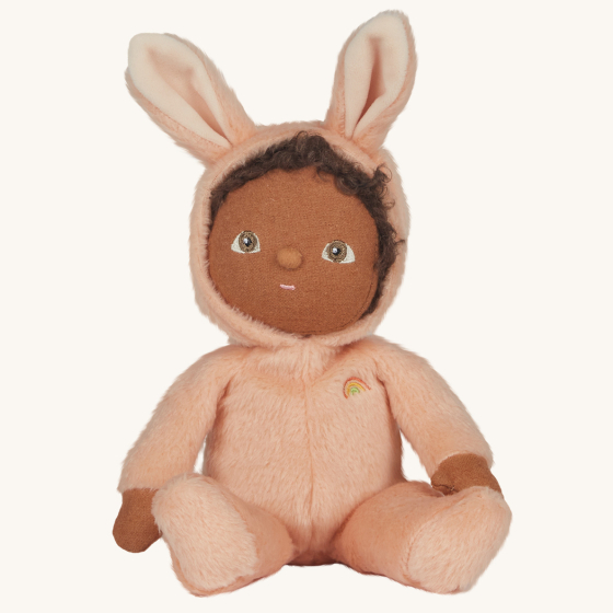 Olli Ella Dinky Dinkum Doll Fluffles - Babs Bunny, wearing a fluffy pink all in one with fluffy bunny ears, on a  cream background