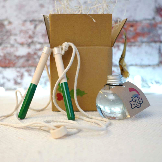 Dr Zigs Christmas Bubble Bauble Gift Set showing the pocket wand and bubble bauble out of the box wit a brick wall background