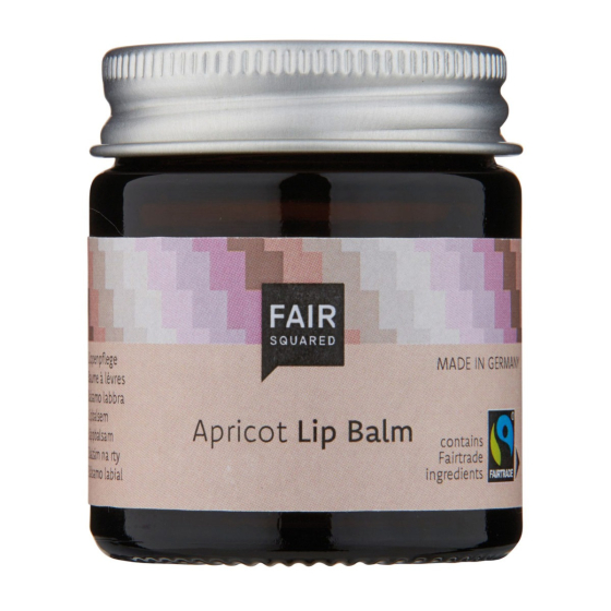 Fair Squared zero waste apricot lip balm jar on a white background