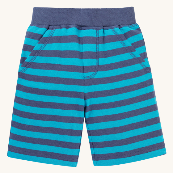 Frugi Children Organic Cotton Ellis Shorts - Tropical Sea / Navy Stripes. A super soft organic cotton these light aqua blue and navy striped shorts have a comfy elasticated waistband and two handy pockets, on a cream background