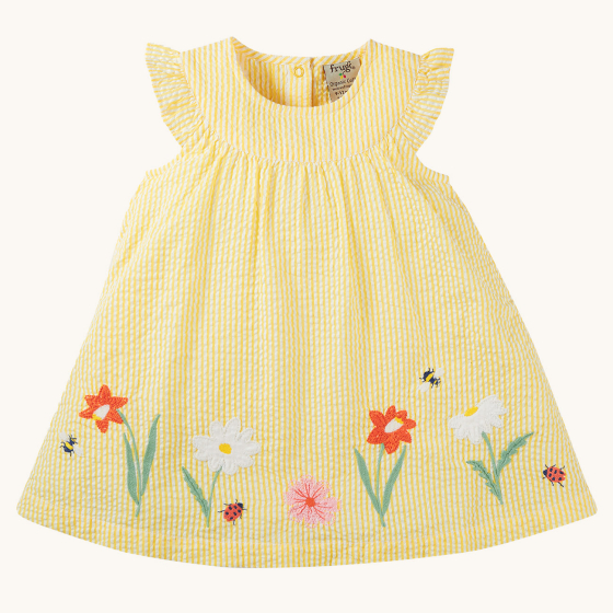 Frugi Organic Cotton Devon Baby Body Dress - Flowers. Made from GOTS organic Cotton,  a beautiful sunny, yellow and white stripe short sleeve dress with frilly shoulders and delicate flower, bee and ladybird applique details on the front of the dress