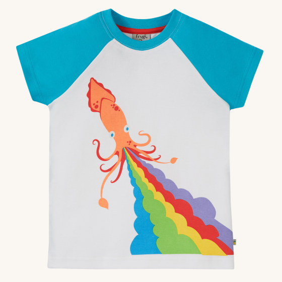 Frugi Children's Organic Cotton Robbie Raglan T-Shirt - Squid. A soft 100% organic cotton t-shirt with a white body, contrasting blue raglan sleeves, and features a playful squid shooting out rainbow ink applique on the front