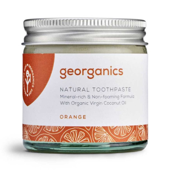 Georganics Natural Orange Toothpaste, in glass jar with metal lid, fluoride free, on white background