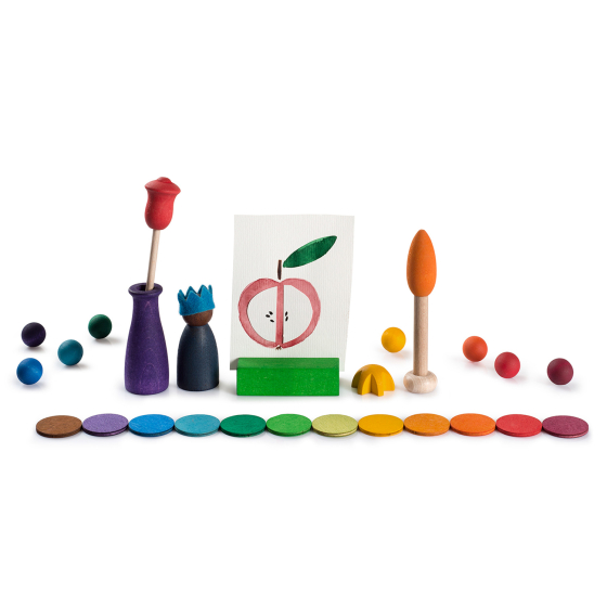 Grapat Your Day Wooden Celebration Set. Hand painted wooden confetti coins, balls and figures including a photo holder, vase, Nin and candle in rainbow colours, on a white background