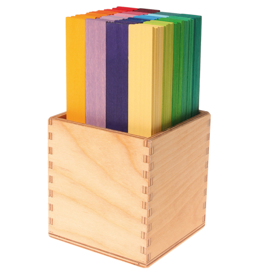 Grimm's leonardo sticks in their wooden storage cube pictured on a plain background 