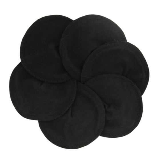 Imse Vimse reusable organic cotton black nursing breast pads laid out in a circle on a white background
