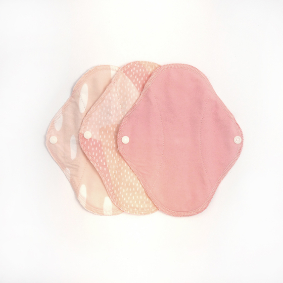 Imse Classic Cloth Pads - Small 3 pack - Pink Sprinkle in light pink with white spots, light pink, beige and neutral tones with white dots and plain pink - all with white popper snaps on a white background