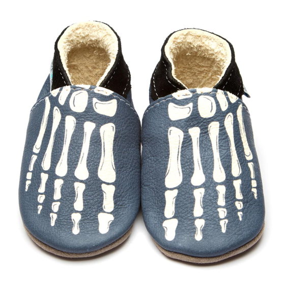 Inch Blue Leather Baby Shoes - Bones on a white background