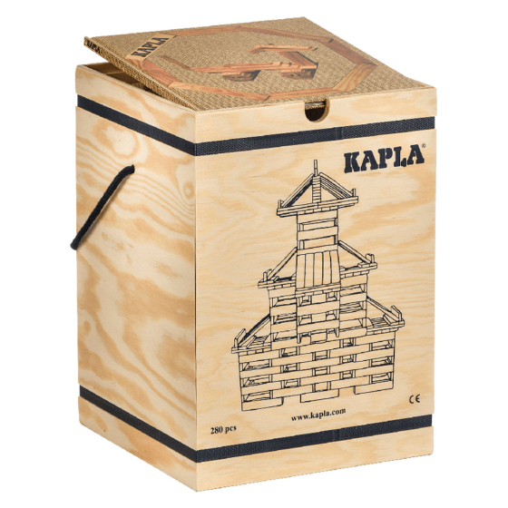 Kapla 280 wooden building blocks set with a beige building guide book on a white background