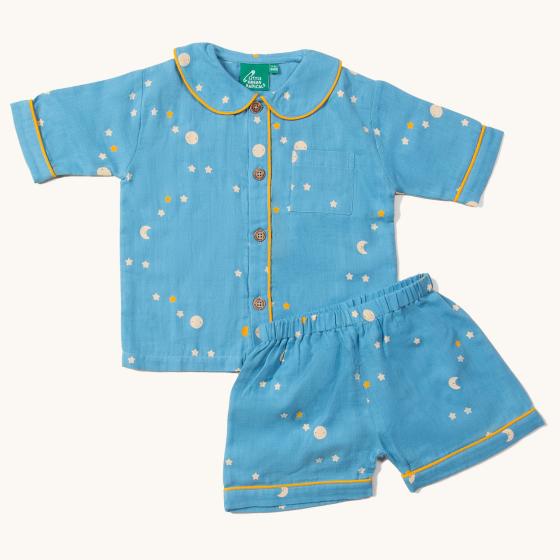 Little Green Radicals Organic Cotton Dusk Button Through Pyjama Short Set. Made from GOTS organic Cotton, these beautiful light blue pyjama shorts and top have delicate stars and moon designs