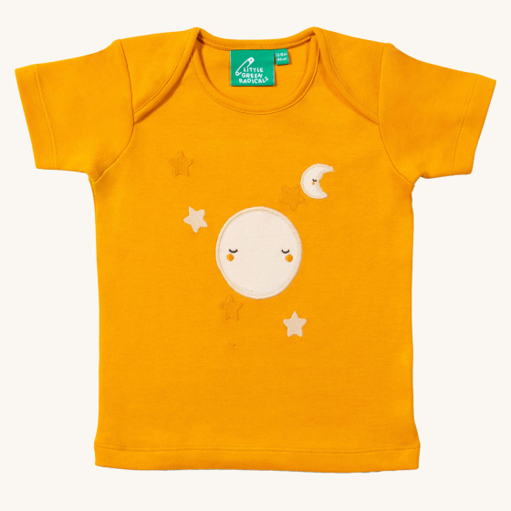 Little Green Radicals Full Moon Applique Short Sleeve T-Shirt. A light orange t-shirt with a sleepy moon and stars applique, made from GOTS organic cotton, on a cream background