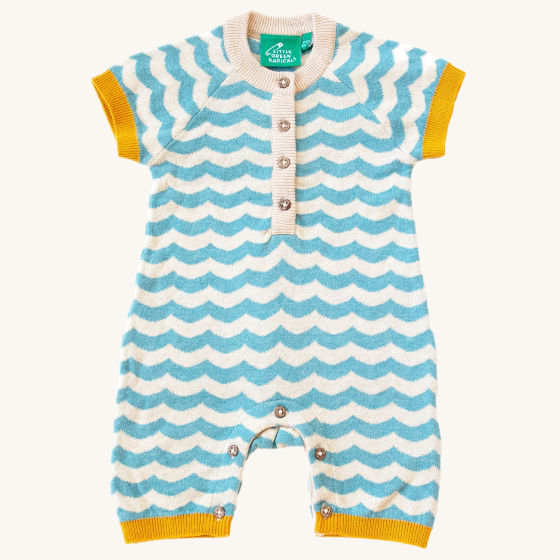 Little Green Radicals Sail Away Knitted Shortie. Made from GOTS Organic Cotton, this shortie has a beautiful blue and cream wavy stripe with yellow arm and leg cuffs, with button on the chest and around the crotch and feet for easy dressing