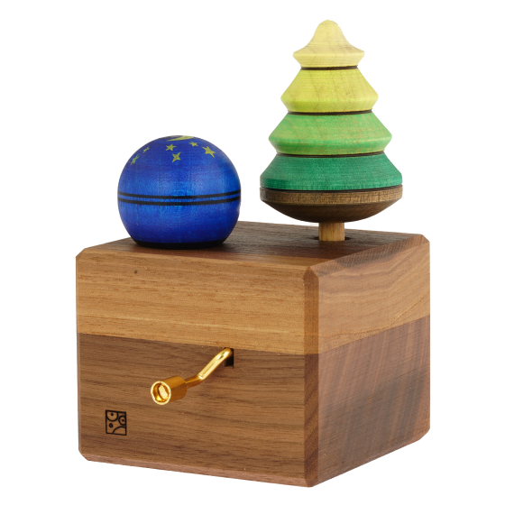 Mader Kreiselmanufaktur Luna Music Box, plays a melody of Ubertrag. A beautiful hand crafted music box from Mader has one Fir tree, and one starry night spinning top sitting in a square walnut base, on a cream background