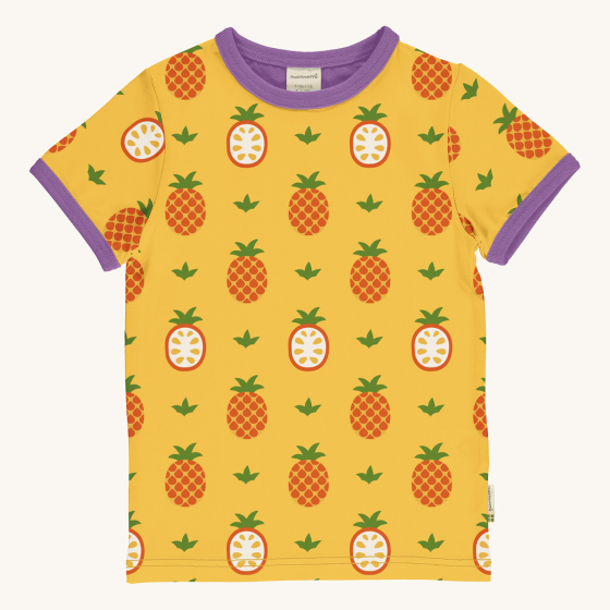Maxomorra Children's Organic Cotton Pineapple Short Sleeve Top. A bright, sunny yellow fabric with fun whole and half pineapple print, purple piping around the neck and sleeves