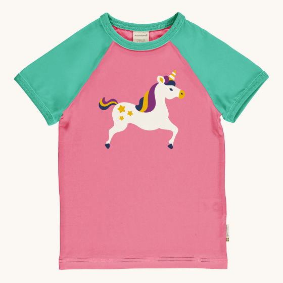Maxomorra Children's Organic Cotton Unicorn Raglan Short Sleeve Top. A vibrant pink fabric with a fun unicorn print on the chest, with green piping on the neck and green sleeves