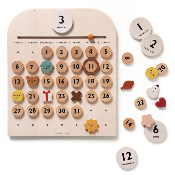 Moon Picnic wooden magnetic calendar set on a white background
