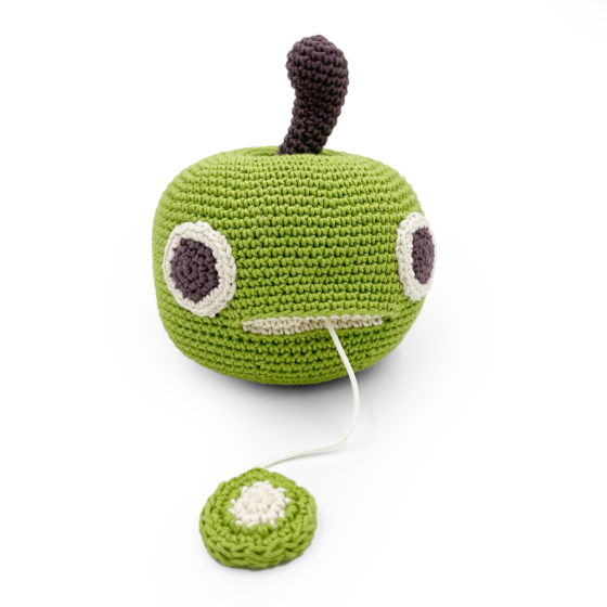Myum handmade crochet ringo apple music toy with the tongue string pulled out on a white background