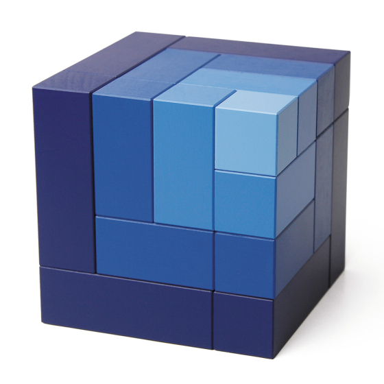 Blue Naef Cubicus toy stacked in its original cube form on a white background.