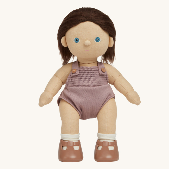 Olli Ella Bitsy poseable, soft bodied Dinkum Doll standing up pictured on a plain coloured background 