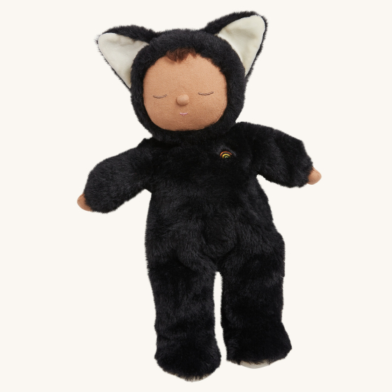 Olli Ella Cozy Dinkums - Black Cat Nox lays on its back on a plain background.