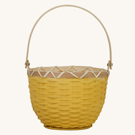 Olli Ella Small mustard yellow Blossom Basket with handle up pictured on a plain background
