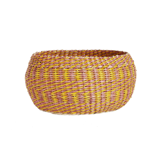 Olli Ella eco-friendly small woven seagrass basket in the clay and mustard colours on a white background