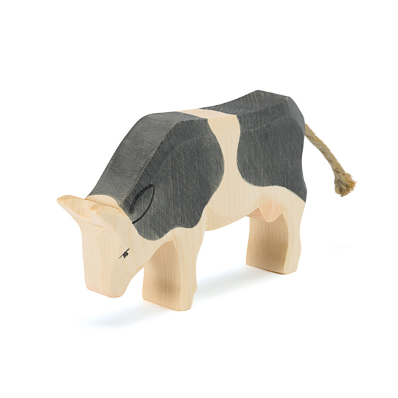 Ostheimer eco-friendly handmade wooden eating cow toy on a white background