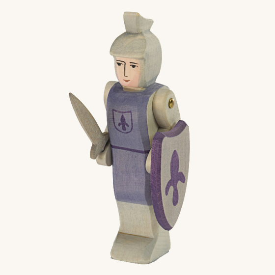 Ostheimer Blue Standing Knight wooden figure pictured on a plain background 